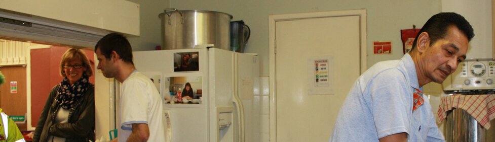 Volunteers working in SHOC's kitchen